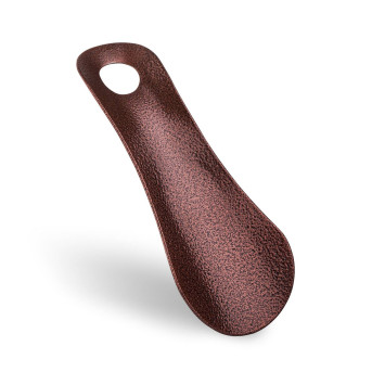 Mała brązowa łyżka do butów...